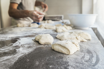 Unrecognizable baker man working.