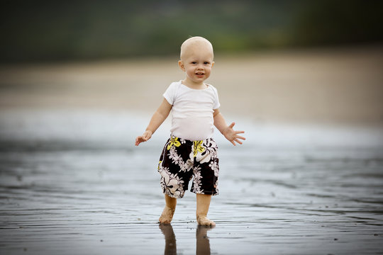 Portrait of a young toddler at the beach.