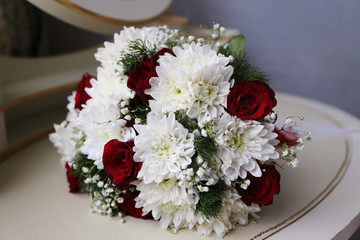 Bridal bouquet of various flowers.