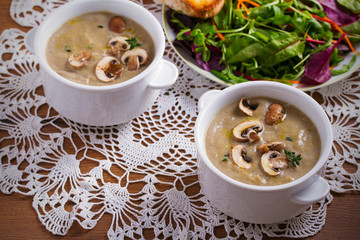 Creamy mushroom soup. Mushroom vegetable soup with thyme and parmesan cheese