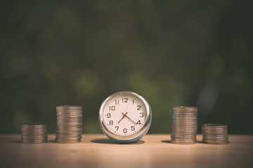 Saving to buy a house or home savings concept with money coin stack growing.Saving money concept.