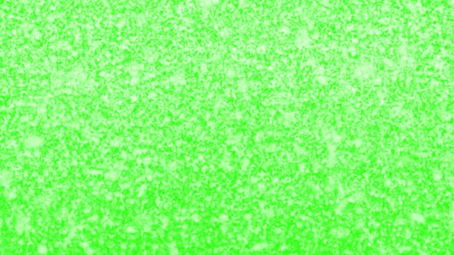 Christmas snow green screen background loop. Heavy dense snow on chroma key greenscreen background. In 4K and HD.
