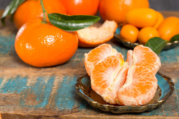 Ripe colorful tropical citrus fruits, mandarins or clementines close up