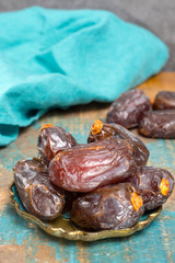 Traditional Middle East dessert, healthy food, big medjool dates fruits.