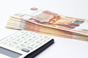 Lots of Money and a close-up calculator