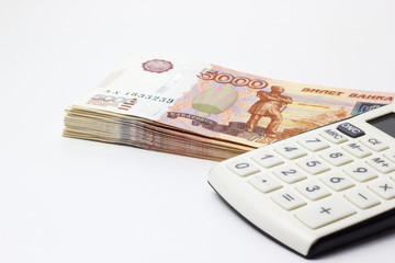 Lots of Money and a close-up calculator