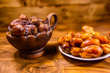 Date fruits on the rustic wooden table