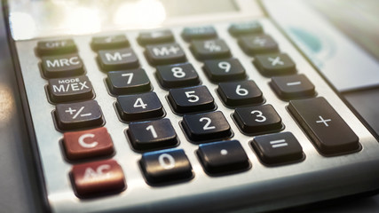 Calculator with black and red buttons