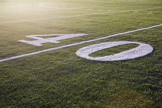 Forty yard line on green football field