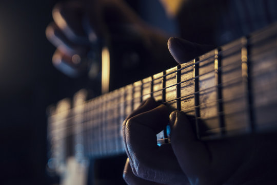 Rock concert, a musician is playing the guitar