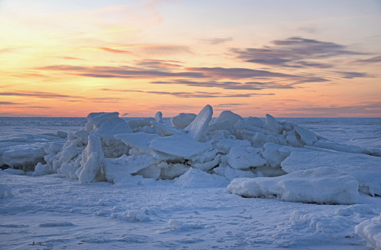 USA, Massachusetts, Eastham, Cape Cod, Frozen sea at dusk