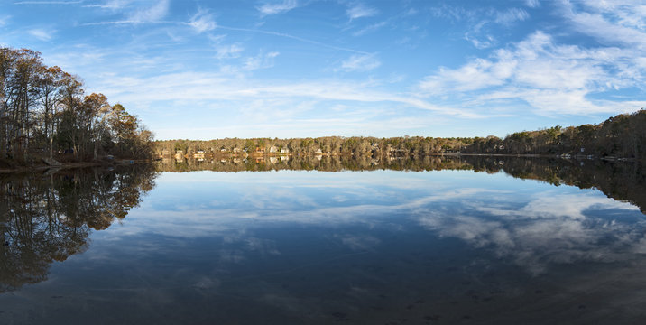 USA, Massachusetts, Cape Cod, Falmouth, Panoramic view of pond with reflection