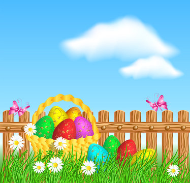 Easter eggs with decorative golden ornament on grass and basket