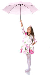 Little girl under an umbrella.