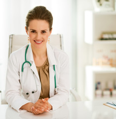 smiling doctor woman in office