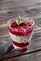 berry dessert on wooden background