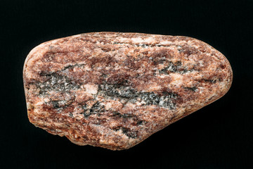 Fototapeta premium Natural mineral stone isolated on black background