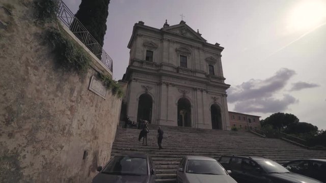 Beautiful tracking shot towards the entrance of the San Gregorio al Celio Church in Rome