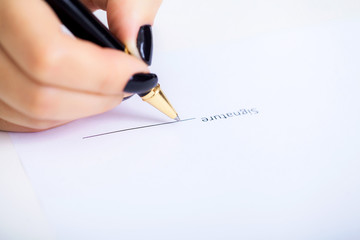 Business woman is signing a contract, business contract details