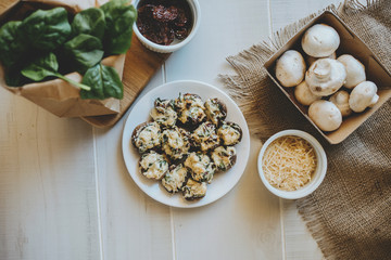 Tuscan Stuffed Mushrooms with sun-dried tomato and spinnach