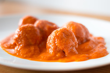 Homemade Polish traditional meatball called in Poland as pulpety with tomato sauce.