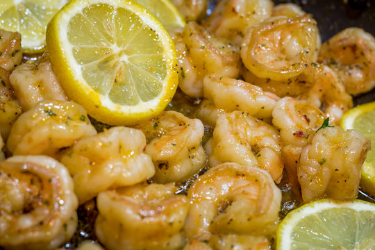 Shrimp Scampi served over zucchini noodles sauteed with lemon, garlic, butter and herbs