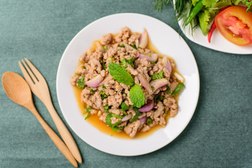 Thai food, spicy minced pork salad (Larb Moo), top view