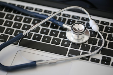 Stethoscope on laptop keyboard