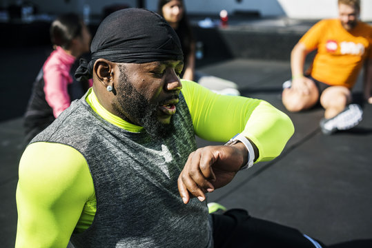 People exercising at fitness gym