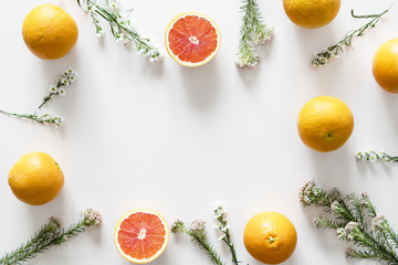 Assortment of tropical citrus fruits background