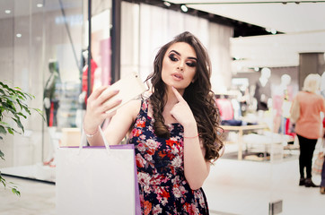 Young amazing woman make photo with mobile phone