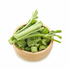 Fresh celery stalks on a white background