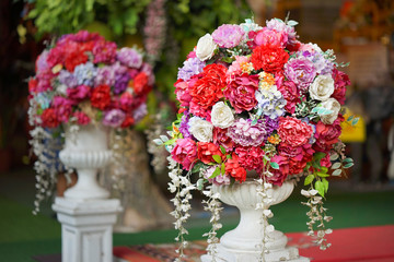 Fake flower and Floral background. rose flowers made of fabric. The fabric flowers bouquet. Colorful of decoration artificial flower