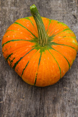 Pumpkin on rustic wooden table