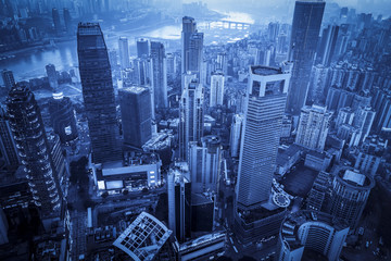 A bird's eye view of the skyline and architectural landscape of the Chongqing river at sunset