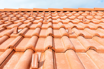 Natural clay tiles on the roof of the house