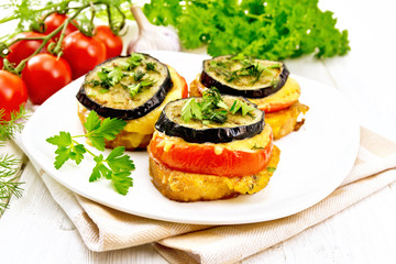 Appetizer of aubergines and cheese on napkin