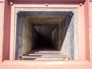 Looking Down Ladder into Old Shaft Metal and Conrete Bunker