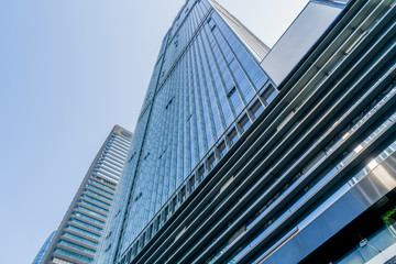 A skyscraper from a low angle view in the modern city of China