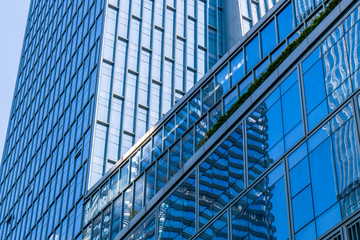 Obraz premium A skyscraper from a low angle view in the modern city of China