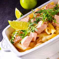 Salmon with penne noodle and arugula