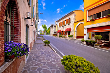 Fototapeta na wymiar Colorful village of Spiazzi street view