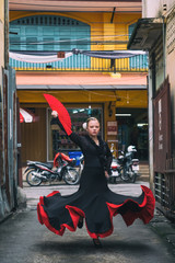 Fototapeta na wymiar Young beautiful flamenco dancing, street dance concept