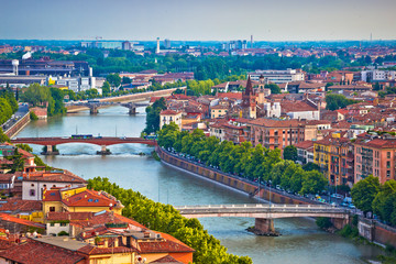 Fototapeta na wymiar Verona bridges and Adige river view