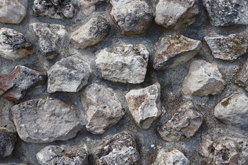 Neatly stacked rough cut stone wall