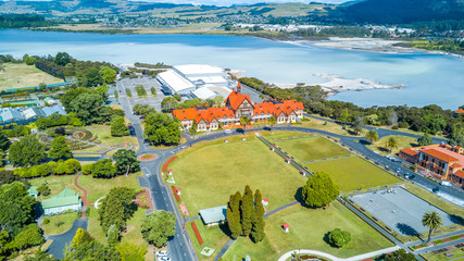 Aerial view on Rotorua Museum with lake and hill on the background. Rotorua, New Zealand.