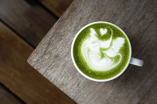 A cup of green tea matcha latte for background