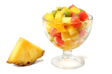 Fototapeta na wymiar Glass bowl of healthy citrus fruit salad isolated on white background
