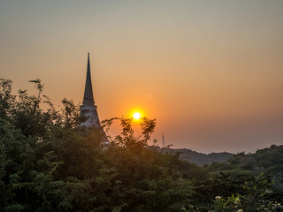 pagoda over the mountain with sunset