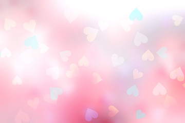 Soft pink blurred hearts background.